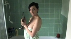 Kim's boobs slip out of her towel