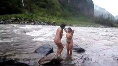 Two indian mature womens bathing in river naked