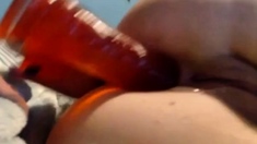 girl takes a big toy up the butt for the first time